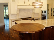 Walnut wood countertop, 54” diameter, large double roman ogee edge, permanent finish. This walnut round top was installed in Charlotte, NC .